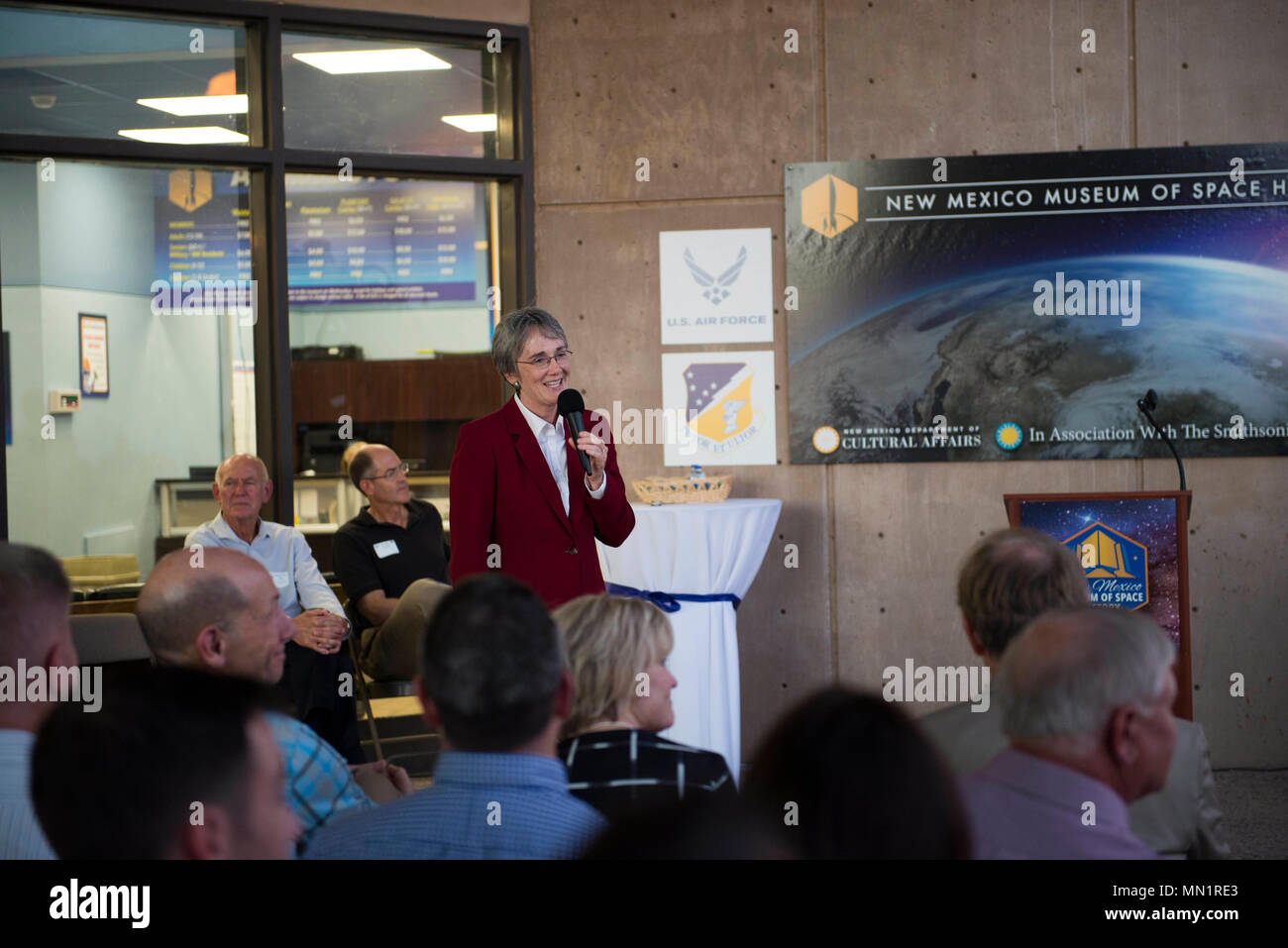 Secretary of the Air Force Heather Wilson speaks with members of MainGate United, at the New Mexico Museum of Space history in Alamogordo, N.M., Aug. 8, 2017. Wilson came to Holloman Air Force Base and is here for a live-fly experiment with off-the-shelf aircraft. The Air Force is pursuing a Light Attack Capabilities Experimentation Campaign, which has grown out of our Close Air Support Experimentation Campaign. The Campaign is being led by the Air Force Strategic Development Planning and Experimentation Office under Air Force Materiel Command. (U.S. Air Force photo by Tech. Sgt. Amanda Junk) Stock Photo