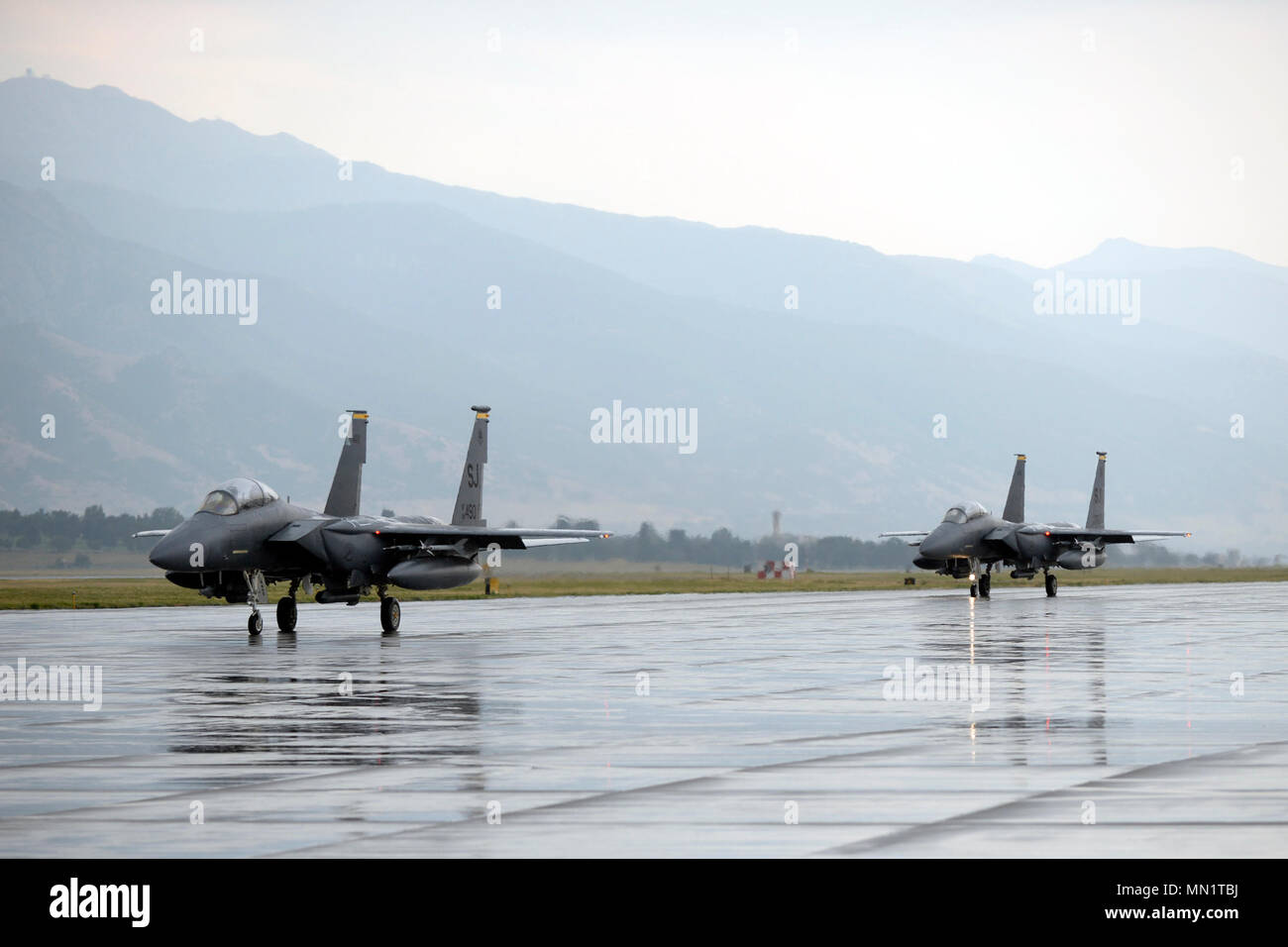 F15 Strike Eagles from Seymour Johnson Air Force Base, North Carolina, proceed down the taxiway