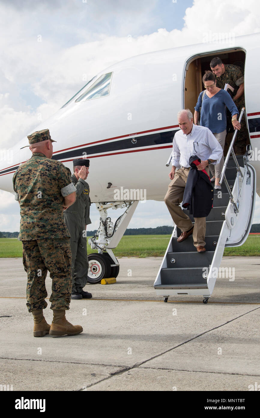 U.S. Marine Corps Brig. Gen. Austin E. Renforth, commanding general, Marine Corps Recruit Depot Parris Island and Eastern Recruiting Regions, greets Secretary of the Navy, Mr. Richard V. Spencer aboard Beaufort, S.C., Aug 10, 2017. Spencer is visiting MCAS Beaufort to tour VMFAT-501 and observe the F-35 aircraft. (Marine Corps photo by Lance Cpl. Erin R. Ramsay/ Released) Stock Photo