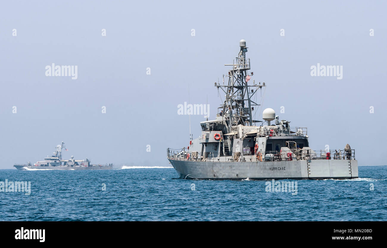 ARABIAN GULF (Aug. 9, 2017) The cyclone-class patrol coastal ship USS Hurricane (PC-3), right, and USS Thunderbolt (PC-12) participate in high-value asset escort training Aug. 9 2017. Exercise Spartan Kopis is a Task Force (TF) 55-led exercise between the U.S. Navy and U.S. Coast Guard in order to increase tactical proficiency, broaden levels of cooperation, enhance mutual capability and support long-term security and stability in the region (U.S. Navy photo by Mass Communication Specialist 2nd Class Sean Furey) Stock Photo