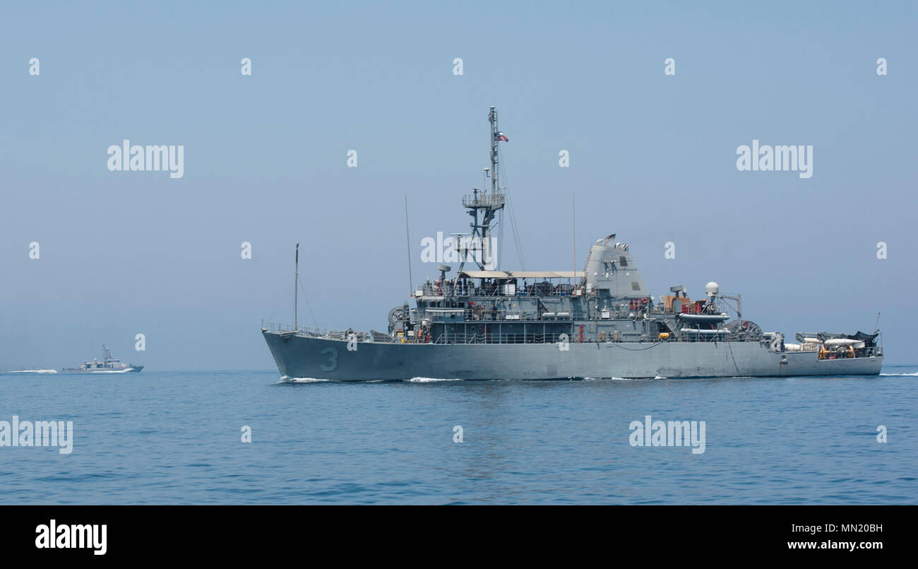 ARABIAN GULF (Aug. 9, 2017) The avenger-class mine countermeasures ship USS Sentry (MCM-3), right, and the cyclone-class patrol coastal ship USS Thunderbolt (PC-12), participate in high-value asset escort training Aug. 9 2017. Exercise Spartan Kopis is a Task Force (TF) 55-led exercise between the U.S. Navy and U.S. Coast Guard in order to increase tactical proficiency, broaden levels of cooperation, enhance mutual capability and support long-term security and stability in the region (U.S. Navy photo by Mass Communication Specialist 2nd Class Sean Furey) Stock Photo