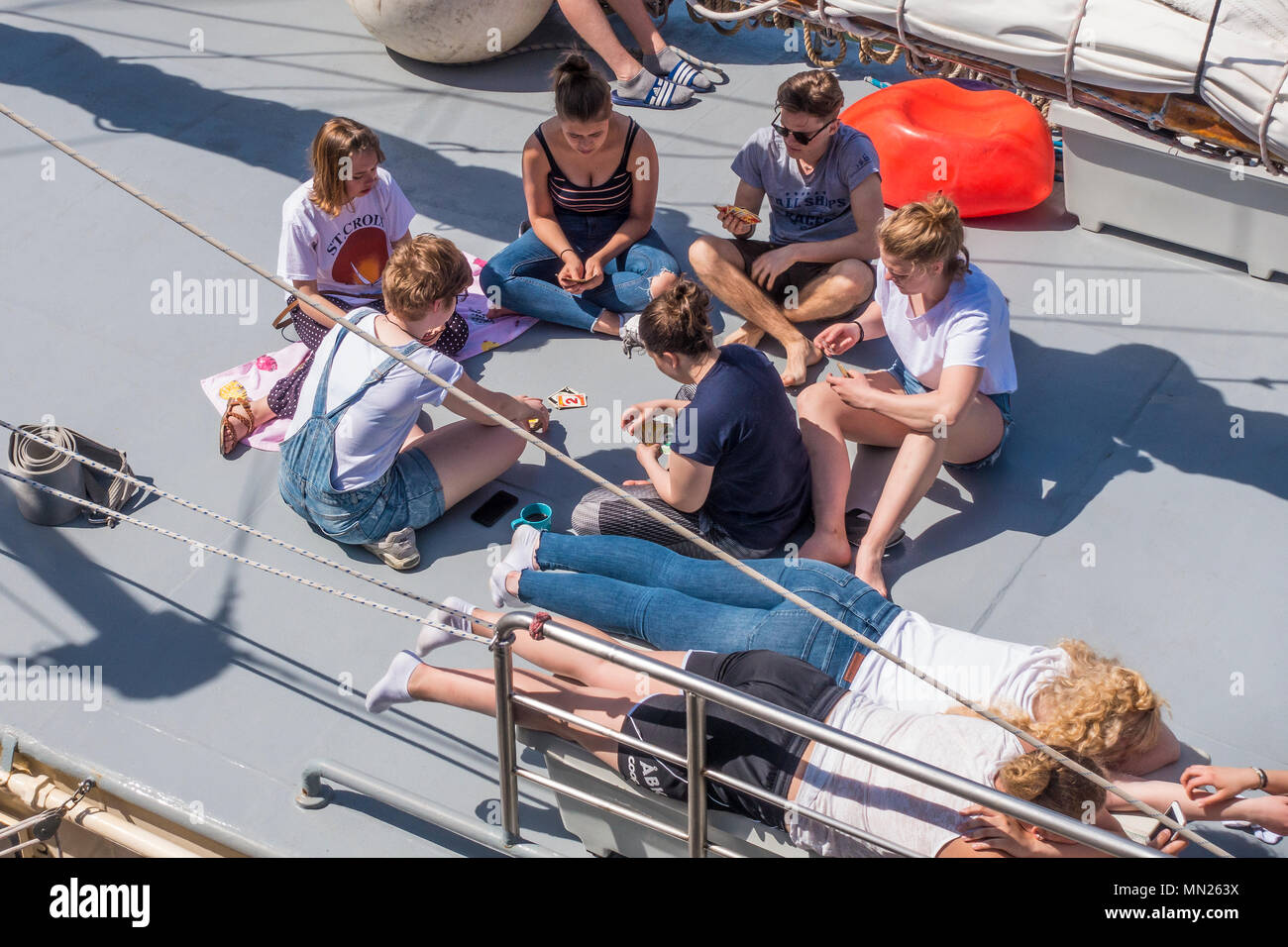 Male,Female,Crew Member,Members,Relaxing,Swedish Sailing Ship,Alva,Moored,Ramsgate Harbour,Ramsgate,Kent Stock Photo