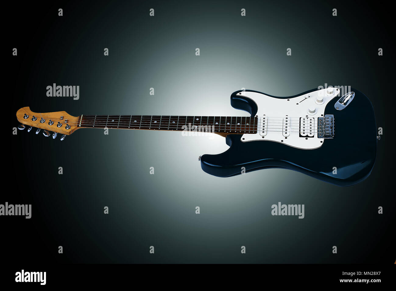 Beautiful guitar. Isolated on a black background with vignette Stock Photo