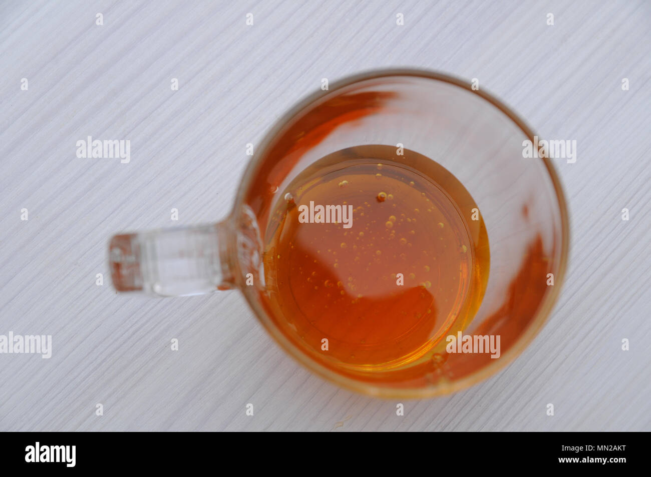 Honey in the glass closeup Stock Photo - Alamy