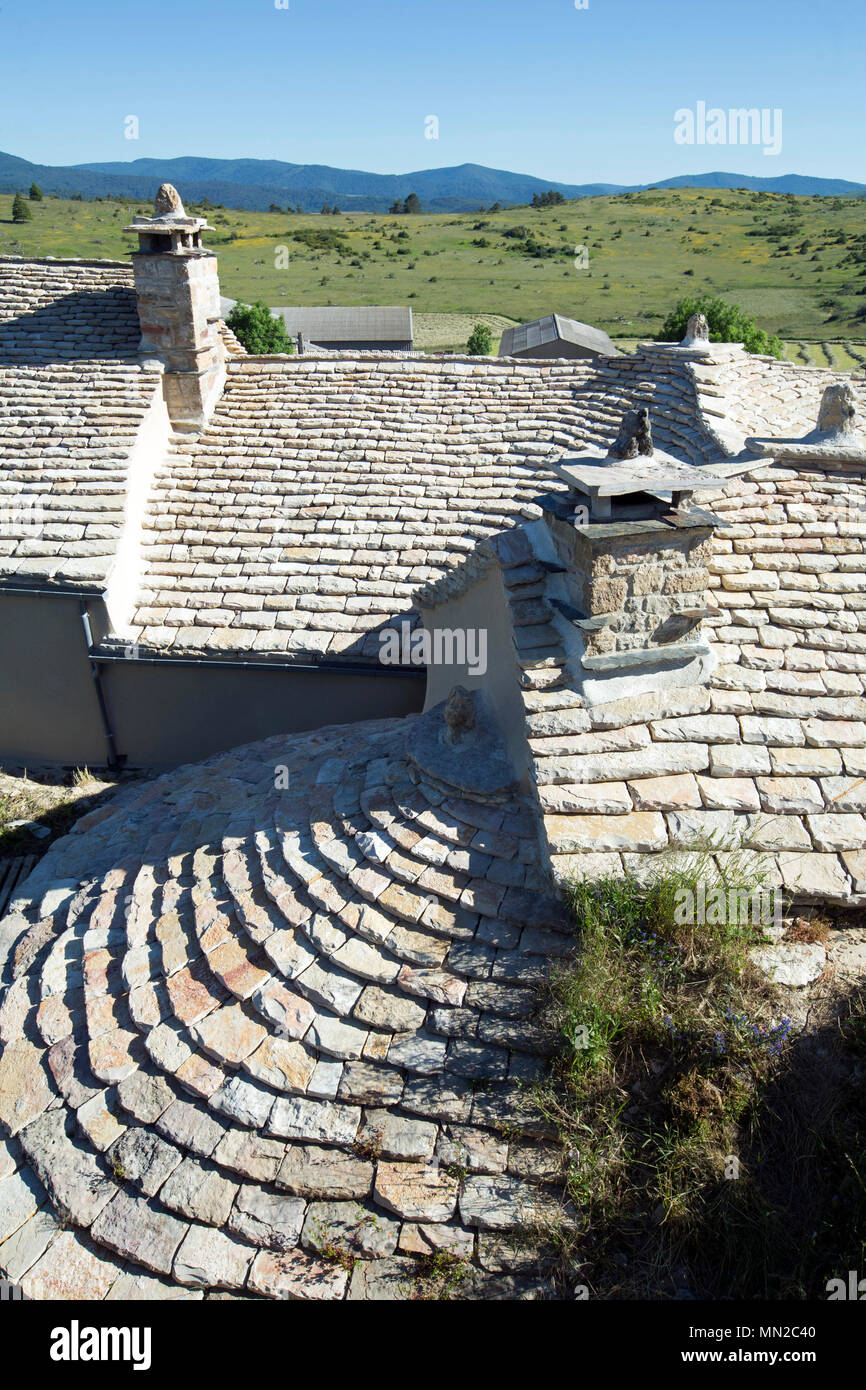 Roof typical from the Lozere department (south of France): white flagstone roof, farm 'ferme de Galy' on the Causse Mejean limestone plateau Stock Photo