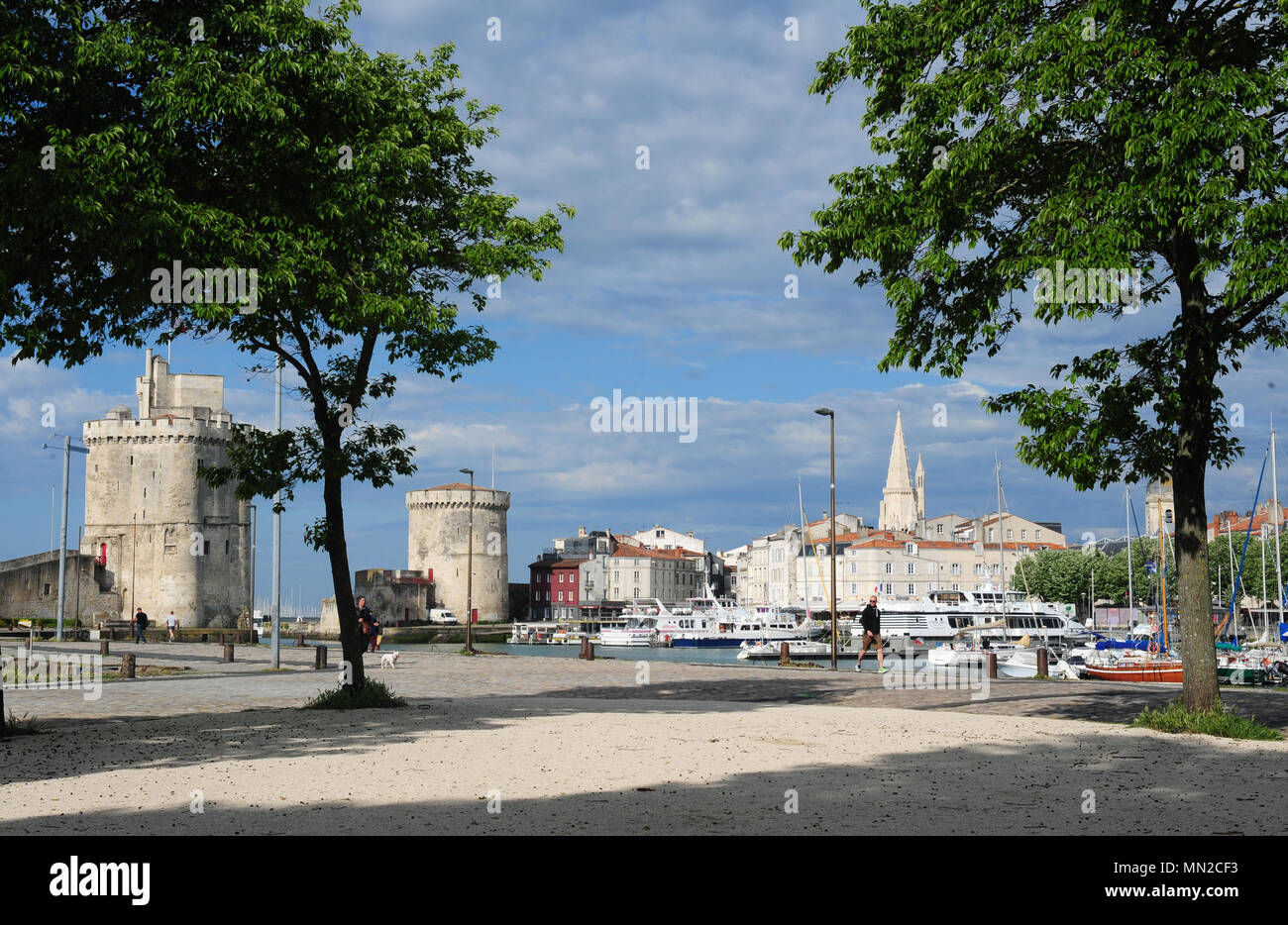 La Rochelle (western France): the Old Port and the towers 'Tour Saint Nicolas' (left) and 'Tour de la Chaine' (right) Stock Photo