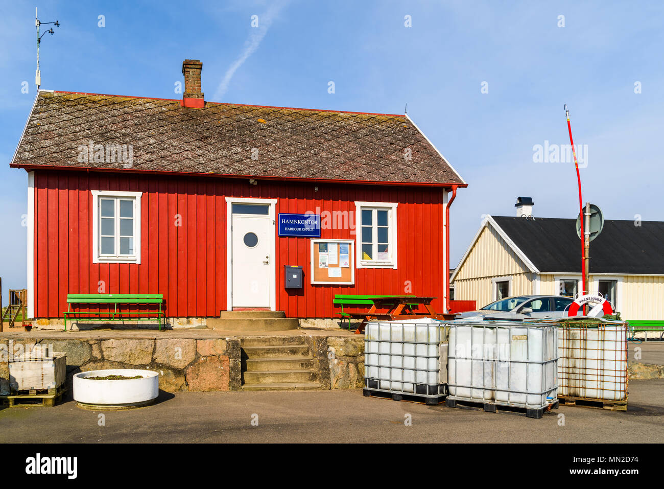 Viken, Sweden - April 30, 2018: Documentary of everyday life and place. The red and white wooden  harbor office. Stock Photo