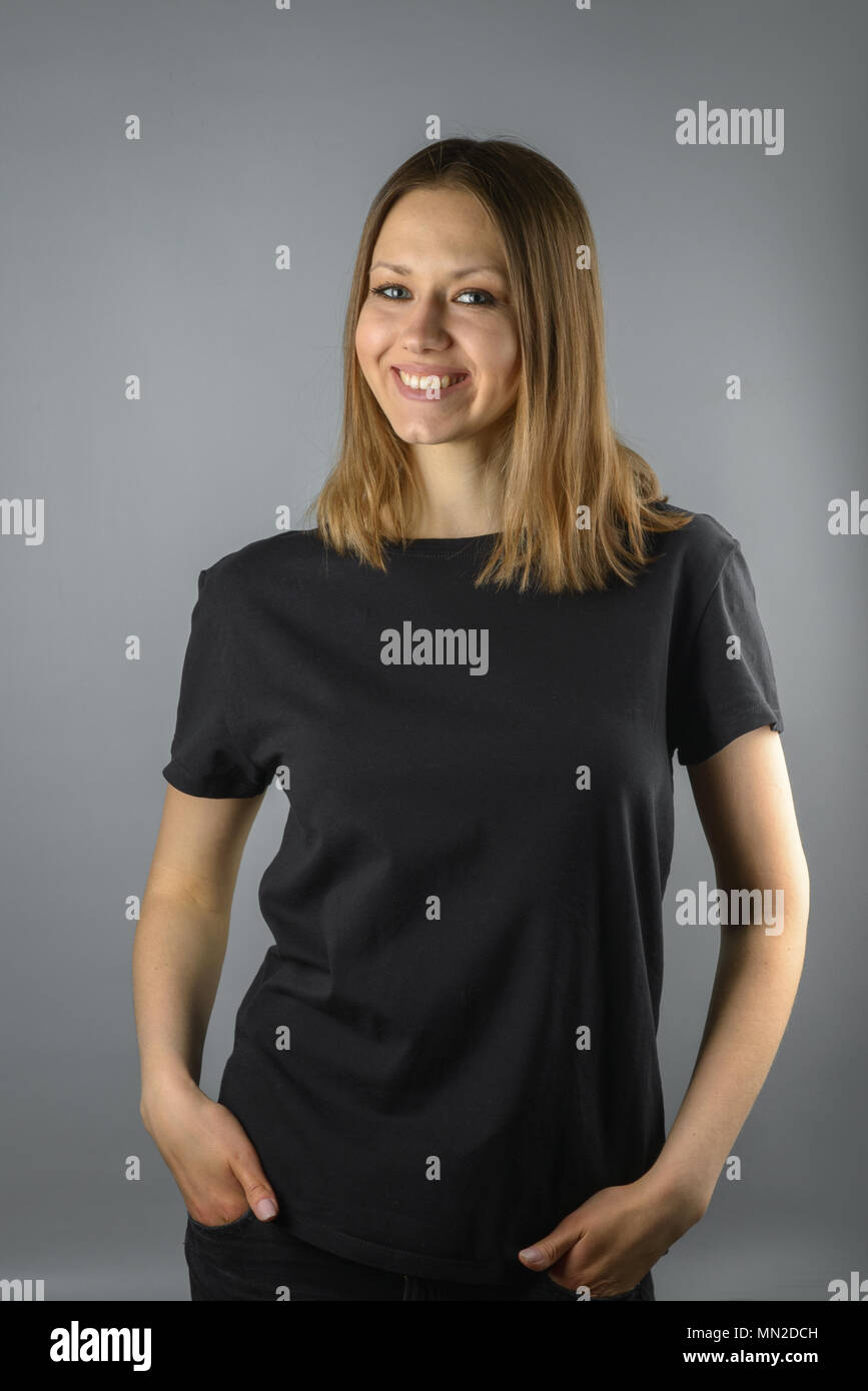 Woman in black T-shirt Stock Photo