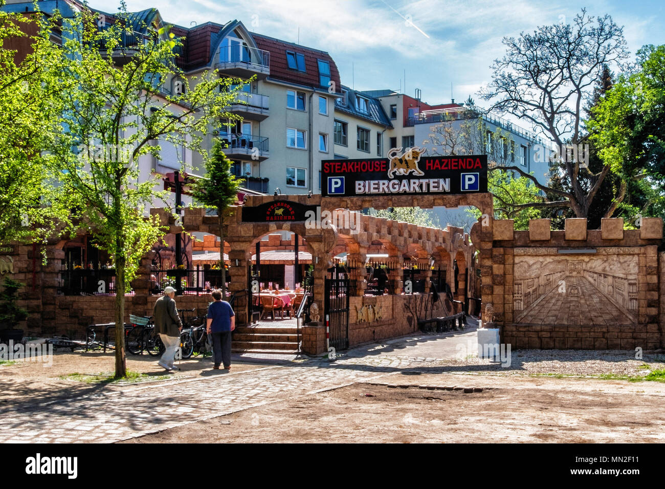 berlin Alt-Mariendorf. Hazienda Steakhouse and beer garden with outdoor tables for alfresco dining Stock Photo