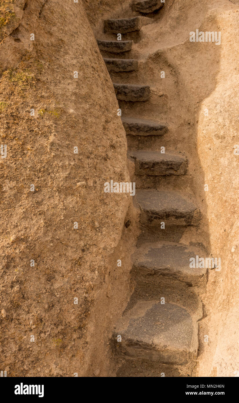 Stone steps leading up through a rock crevice at Bandelier National Monument, New Mexico, USA. Stock Photo