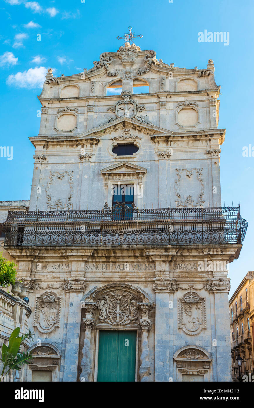 Facade of the church of Santa Lucia Alla Badia in the Piazza Duomo in the old town of the historic village of Siracusa in Sicily, Italy Stock Photo