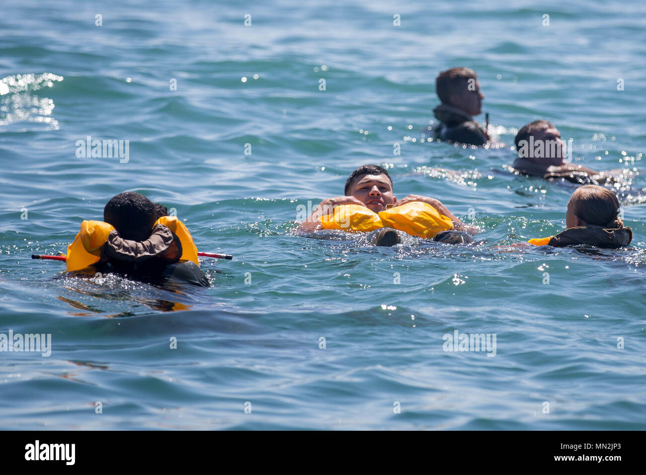 U.S. Marines with 3rd Assault Amphibian Battalion, swim during an