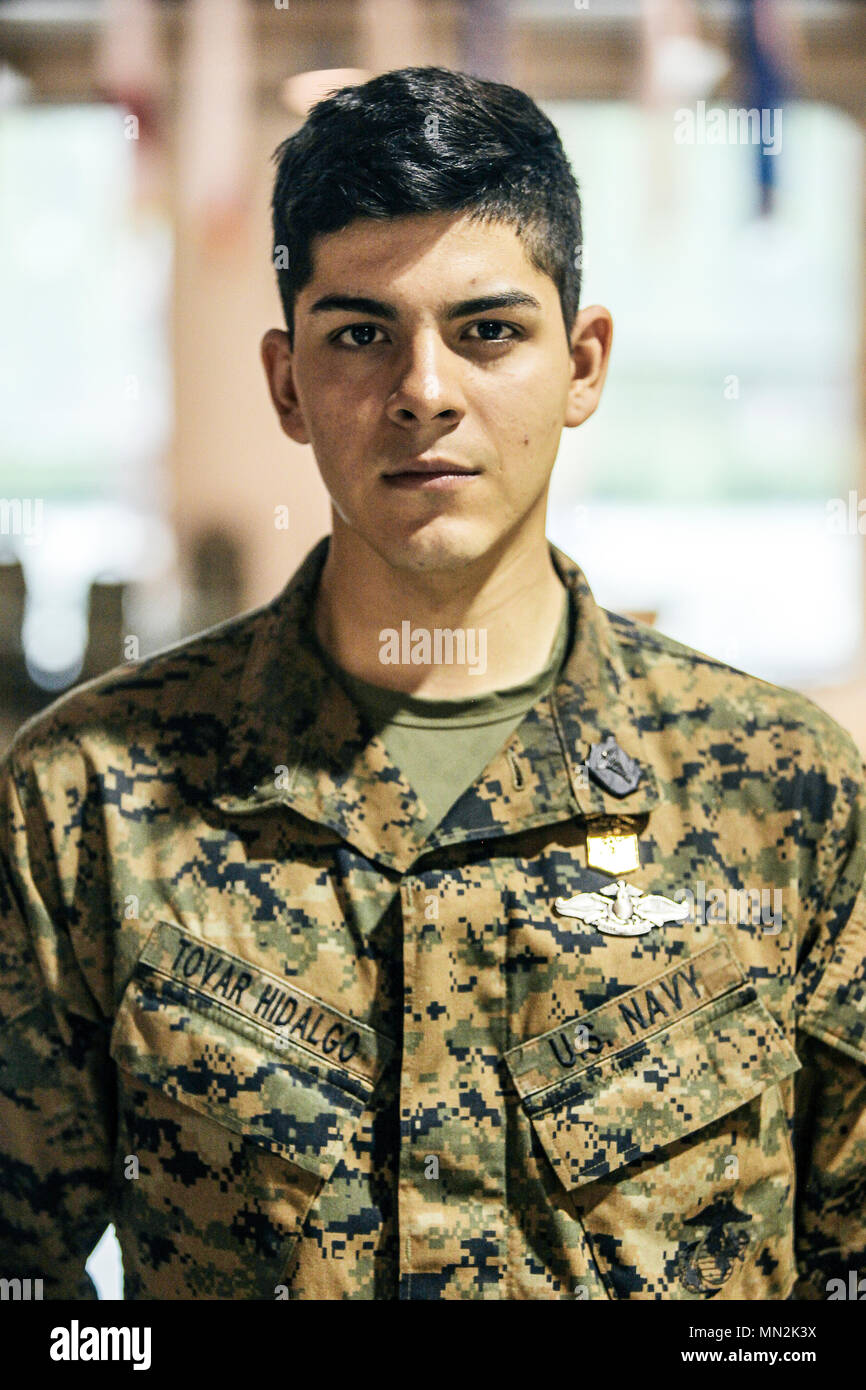U.S. Navy Corpsman Petty Officer 3rd Class Daniel Tovar with 2nd