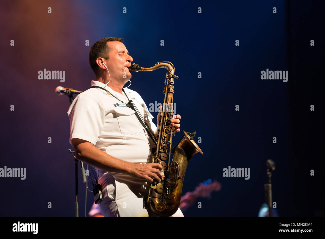 ALMA, Ark. (Aug. 18, 2017) Musician 1st Class Manuel Pelayo de Gongora performs with the U.S. Navy Band Cruisers popular music group at the Alma Performing Arts Center in Alma, Arkansas. The U.S. Navy Band performed in four states during its 14-city national tour, connecting the Navy to communities that don't see Sailors at work on a regular basis. (U.S. Navy photo by Chief Musician Adam Grimm/Released) Stock Photo