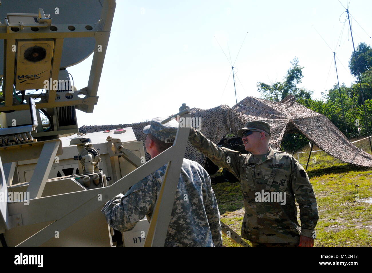 U.S. Army Sgt. James Derrickson, left, and Spc. Greg Ebersol, signal