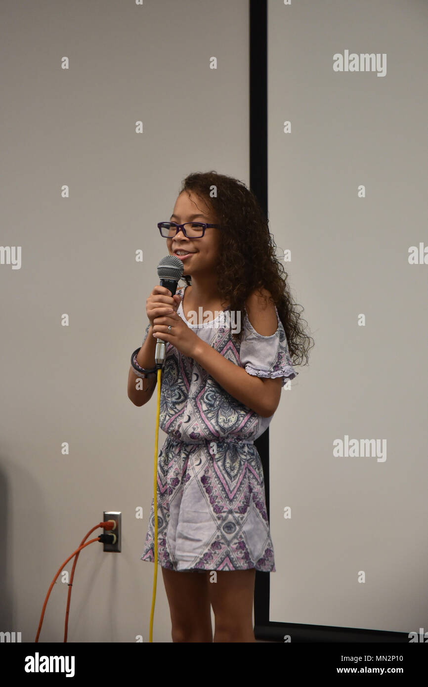 Mariah Mobley, 10, sings "I Will Survive" in the 50th Force Support
