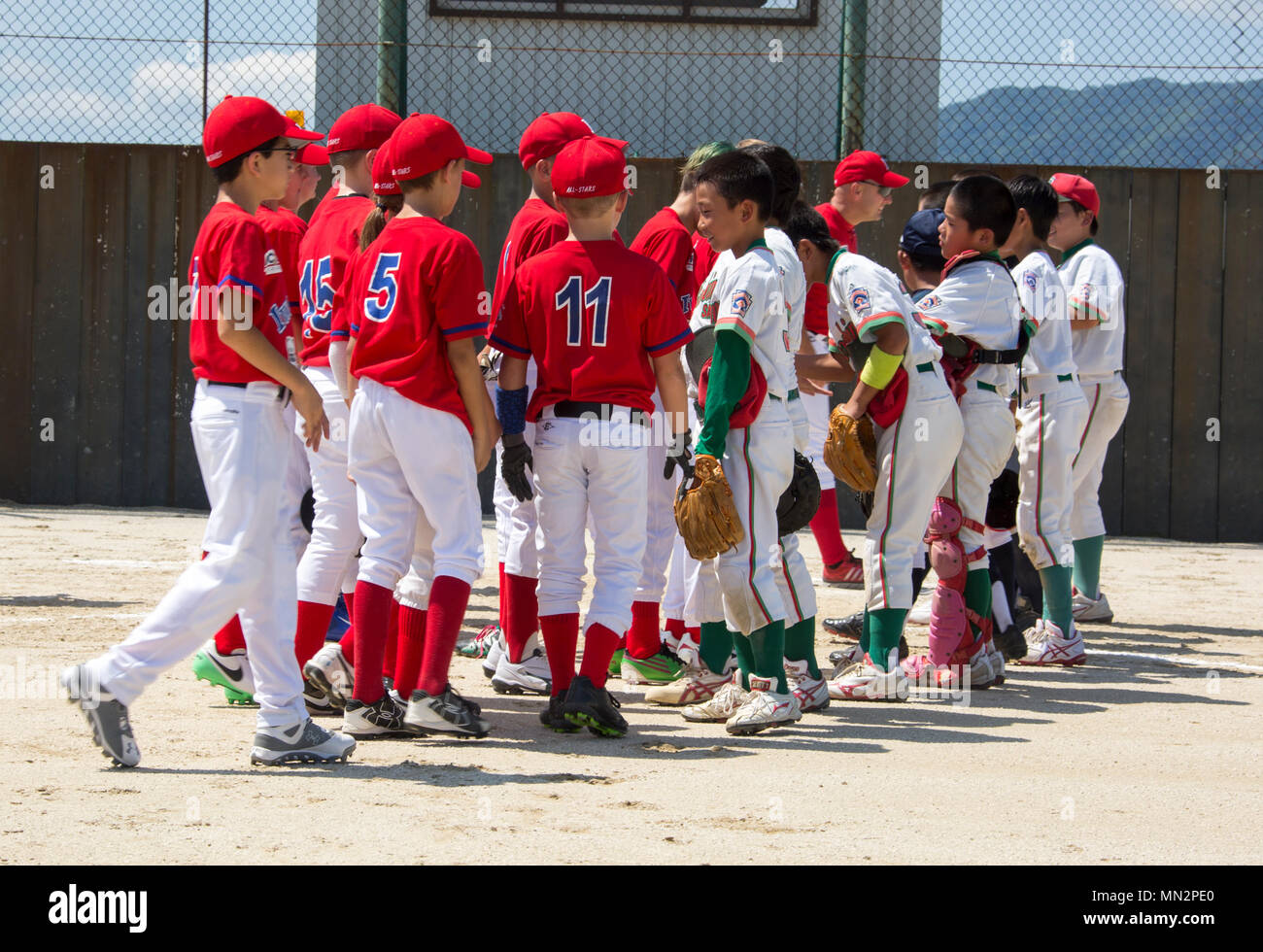 The Iwakuni All Stars congratulate and shake hands with Hiroshima