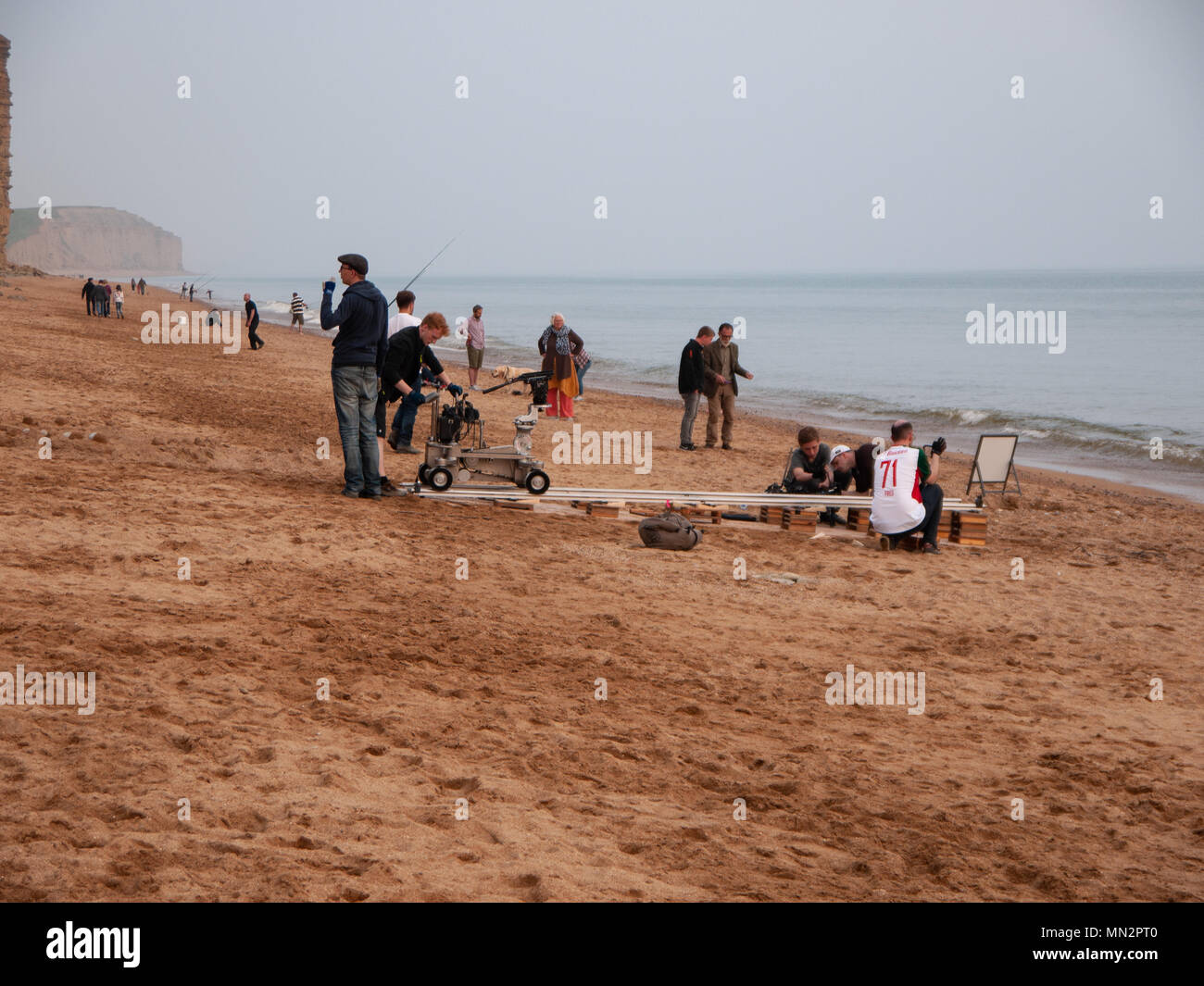 Film / Movie production on West Bay beach, Dorset, UK Stock Photo