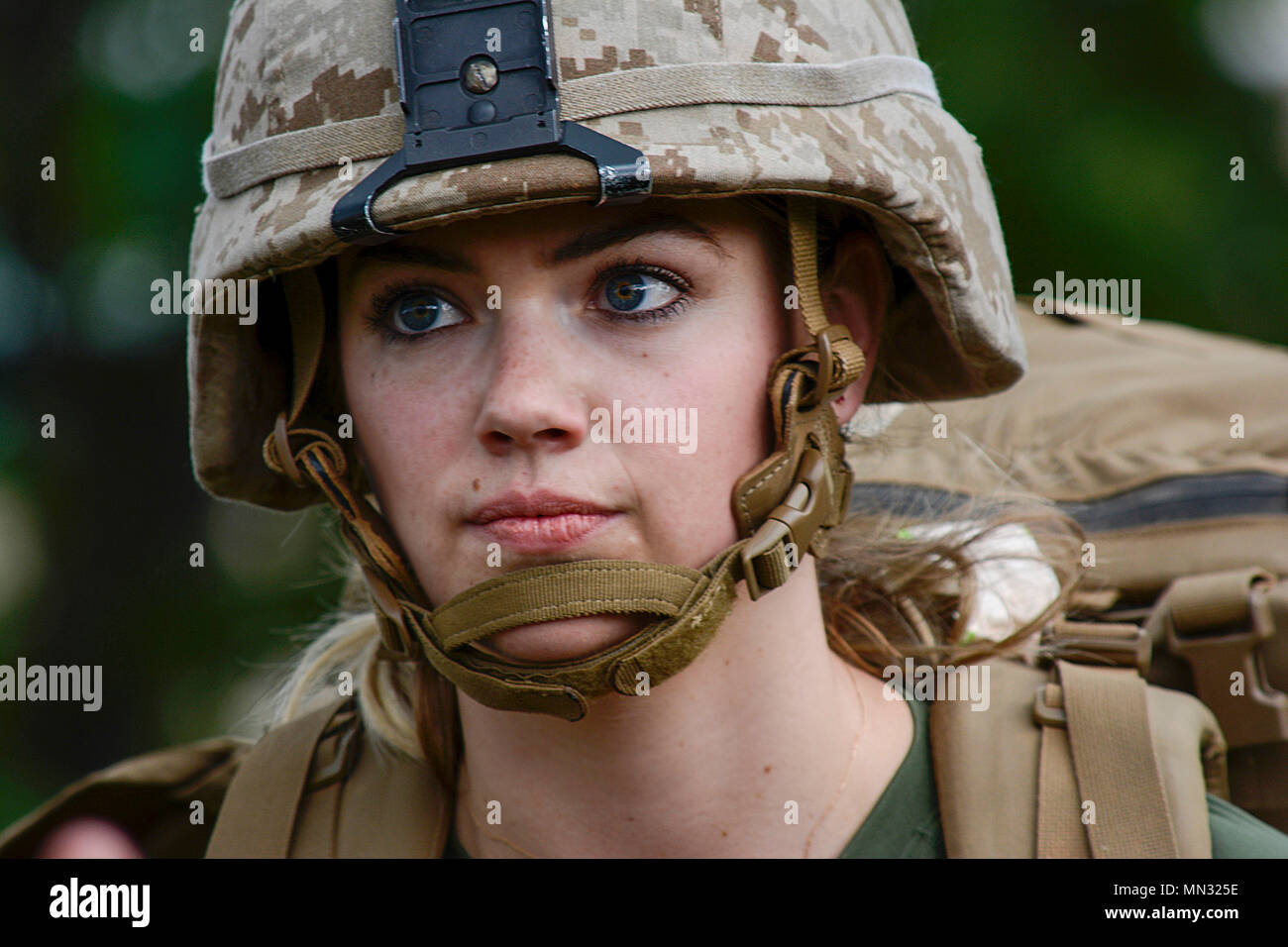 Kate Upton wears a U.S. Marine Corps Kevlar and pack at Wayne State