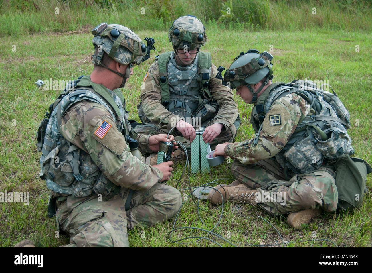 Spc. Stephen Knoff, left, Pvt. Jon Mauk, center, and Pvt. Matthew ...