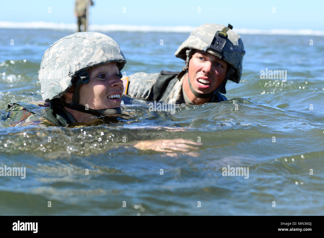 Oregon Army National Guard Sgt. Tiffany Markham (left), 1249th Engineer