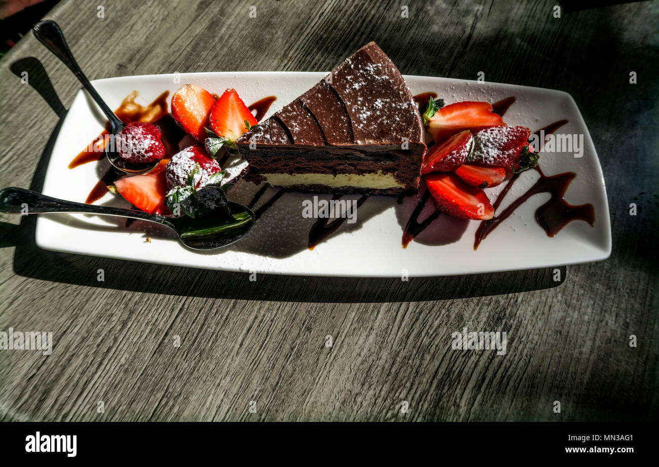 Chocolate cake and strawberries Stock Photo