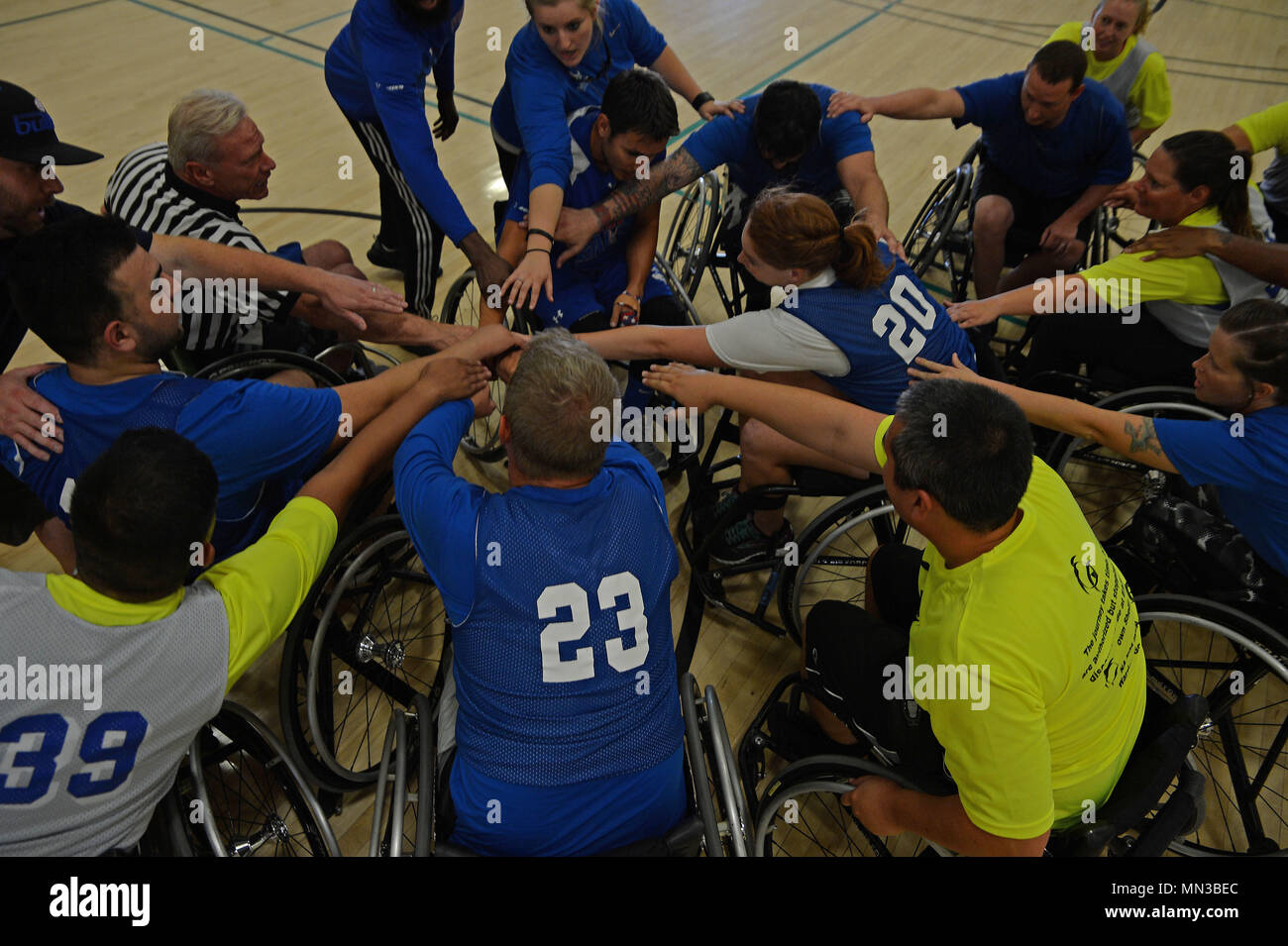 Participants of the Air force Wounded Warrior Program, play wheelchair basketball during the 2017 Joint Adaptive Sports Camp Aug. 29, 2017, at Joint Base Lewis-McChord, Wash. During Aug. 28-31, JBLM supported the 2017 JASC management team as they hosted a joint services camp at Cowan and Memorial Stadiums, and at other athletic venues across the installation. Cowan Stadium and Memorial Field was setup for all track and field events. The Directorate of Family and Morale, Welfare and Recreation tent was used for archery and shooting events, and Soldier’s Field House was used for swimming events. Stock Photo