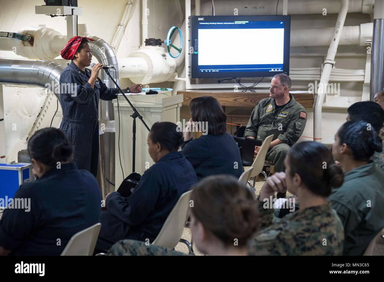 SOUTH CHINA SEA (Aug. 26, 2017) Chief Damage Controlman Susan Dang, a native of Thornton, Colorado, assigned to the Engineering department aboard the amphibious transport dock ship USS San Diego (LPD 22) speaks on her experience on women’s equality in the ship’s chapel. San Diego, part of the America Amphibious Ready Group, with embarked 15th Marine Expeditionary Unit, is operating in the Indo-Asia Pacific region to strengthen partnerships and serve as a ready-response force for any type of contingency. (U.S. Navy photo by Mass Communication Specialist 3rd Class Justin A. Schoenberger/Released Stock Photo