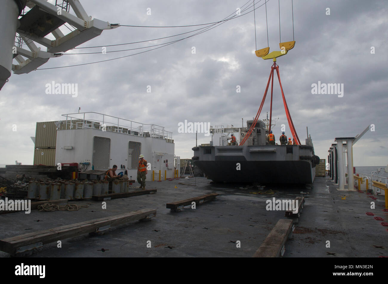 On August 9, 2017, sailors from Navy Cargo Handling Battalion One ...