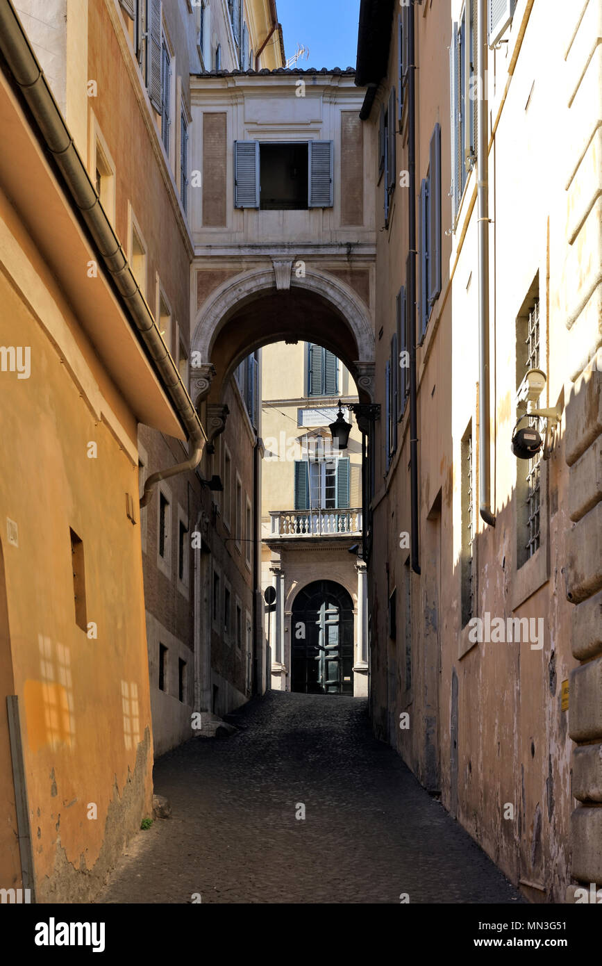 The narrow lane arched Vicolo Scanderbeg which leads to the Piazza Scanderbeg, Rome, Italy. Stock Photo