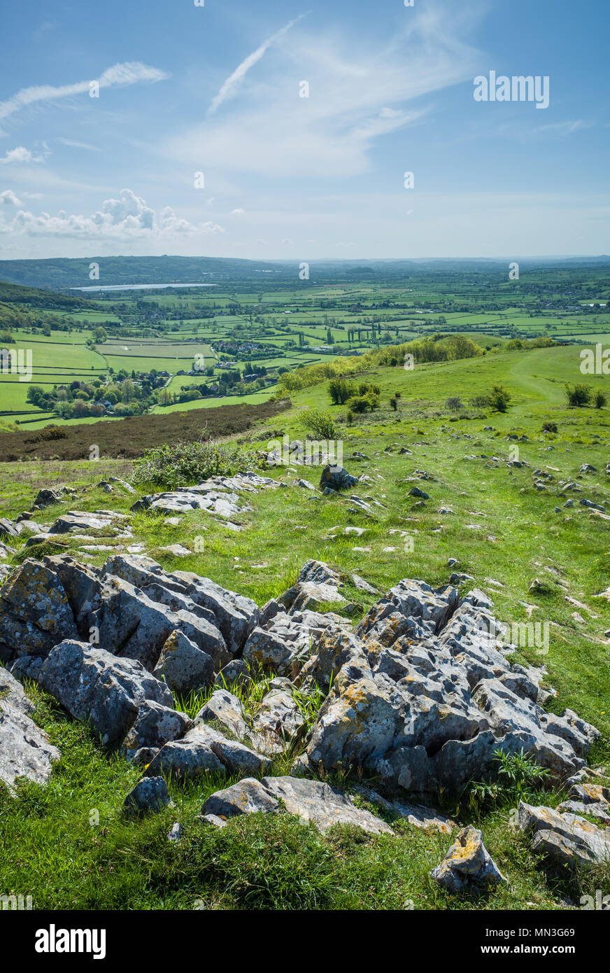 A vibrant and colourful image of the beautiful view from Crook Peak towards Cheddar and Glastonbury in The Mendip Hills, Somerset, UK. Stock Photo