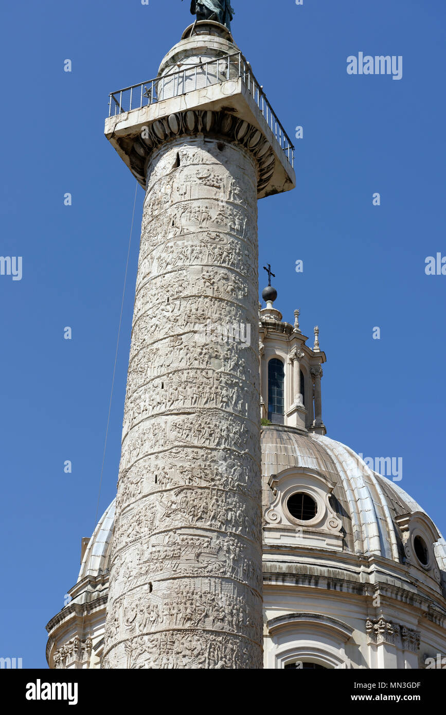 Close view of the sculptural art detail of Trajan’s column in the forum of Roman emperor Trajan, Rome, Italy. The free standing and marble Trajan's Co Stock Photo