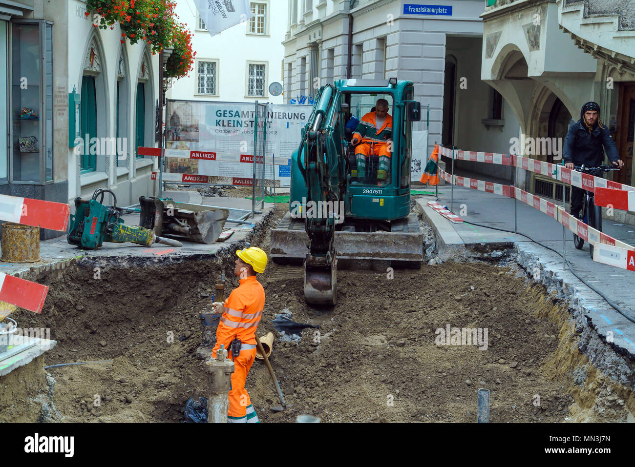 Caucasian Plumber Worker Wearing Safety Gloves Adjusting Water Sewage  Residential Stock Photo by ©welcomia 415928518