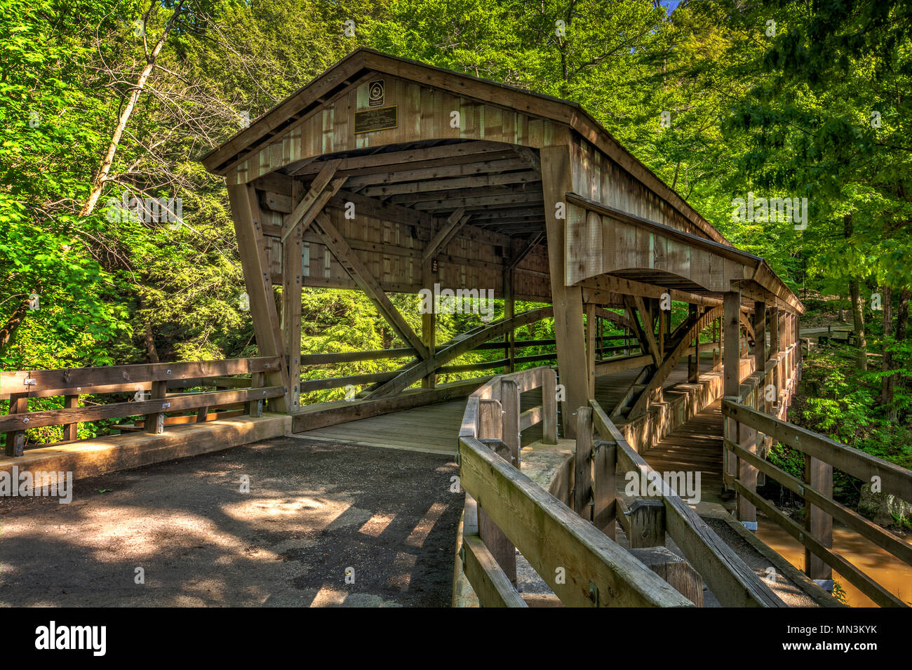 The covered bridge at Lanterman's Mill in Mill Creek Park in Youngstown Ohio. Built in 1989. Stock Photo