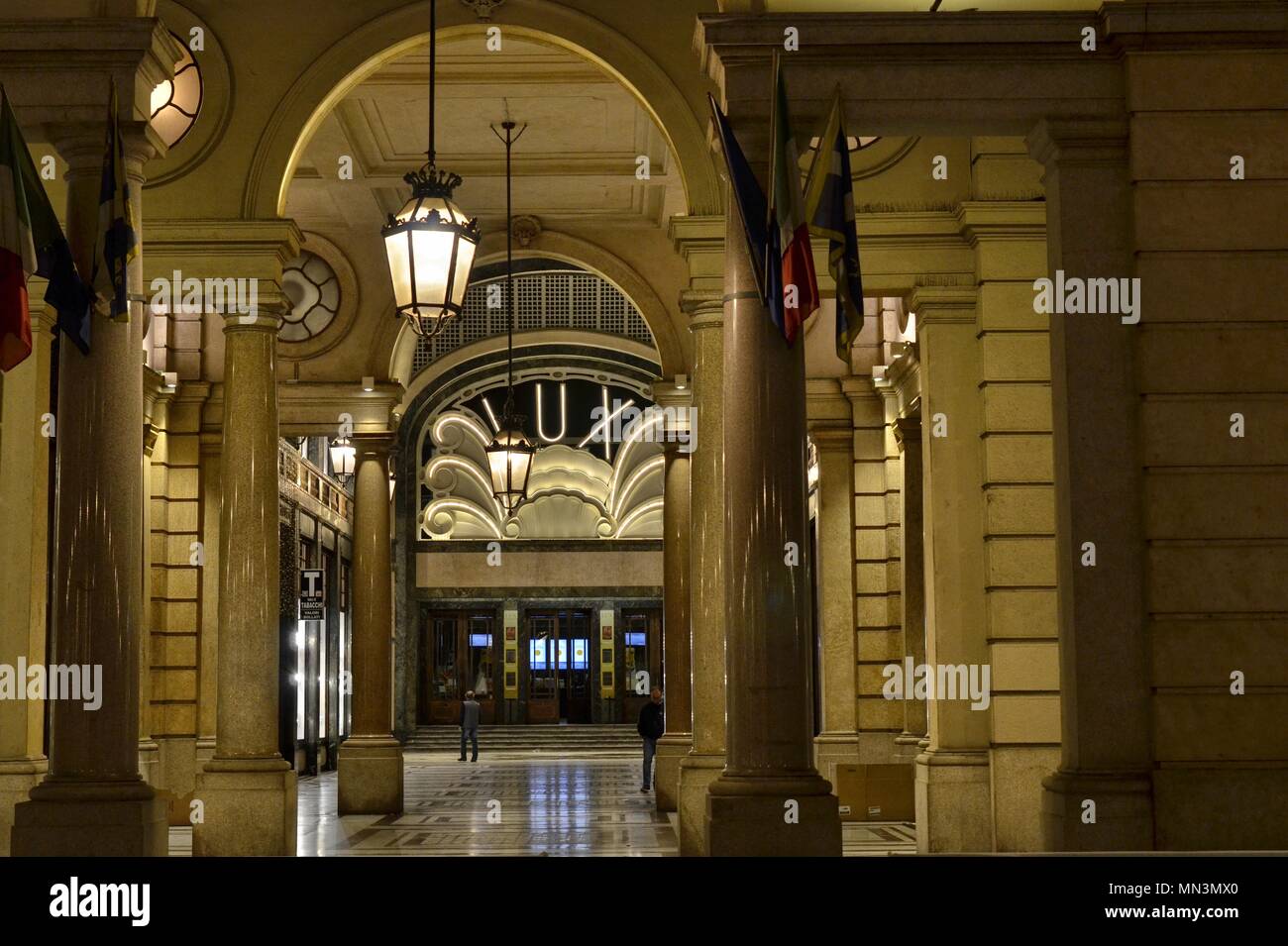 Turin, Piedmont, Italy. May 12, 2018. The Lux cinema (1934), in the San Federico gallery. Point of view from the adjacent Via Roma. Stock Photo