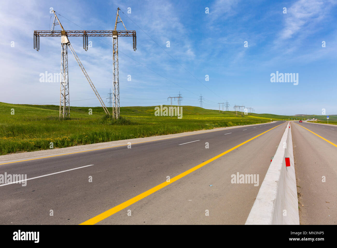 Power lines along the highway Stock Photo Alamy