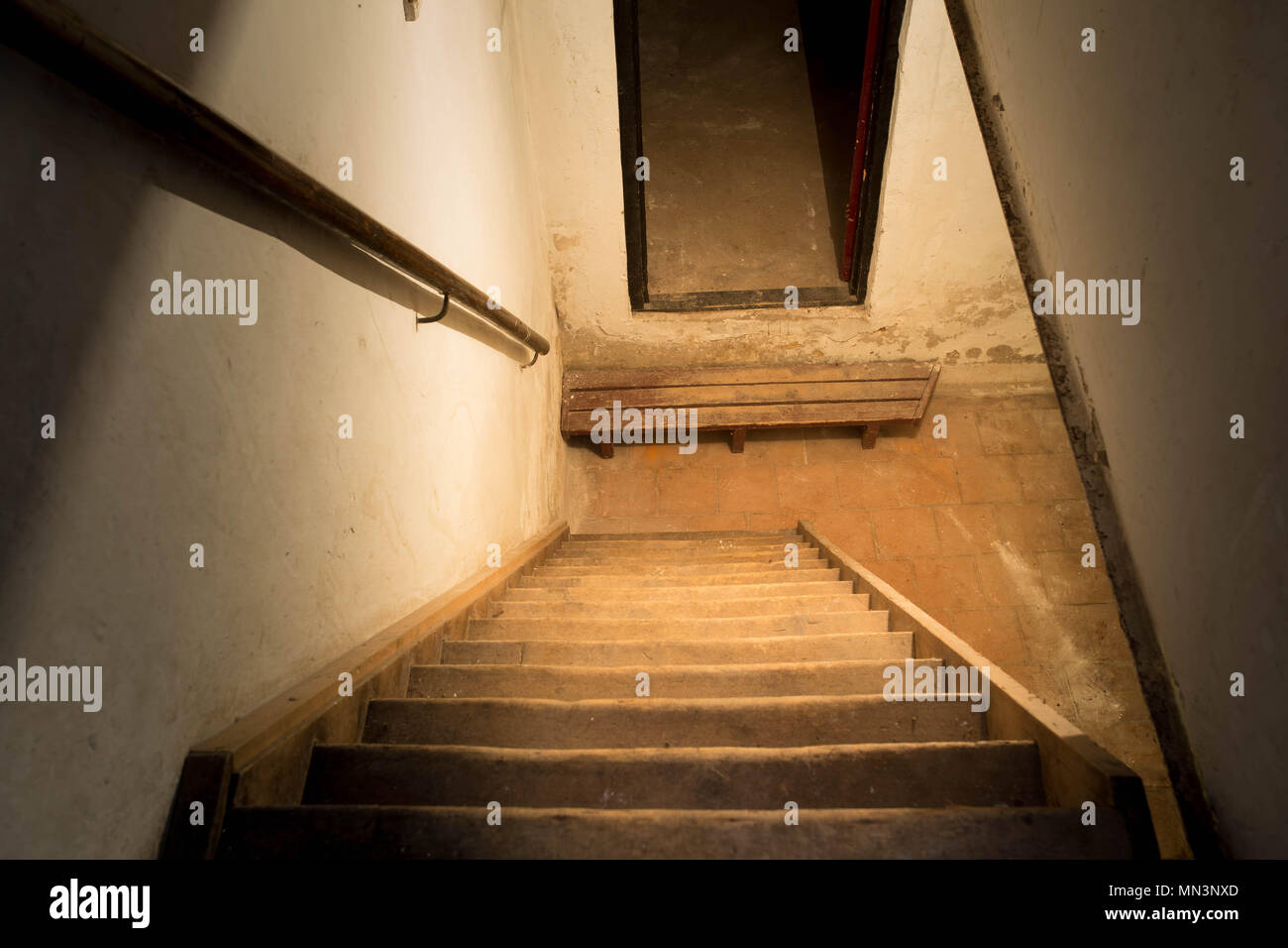 Scary dark wooden stairs to the old basement Stock Photo