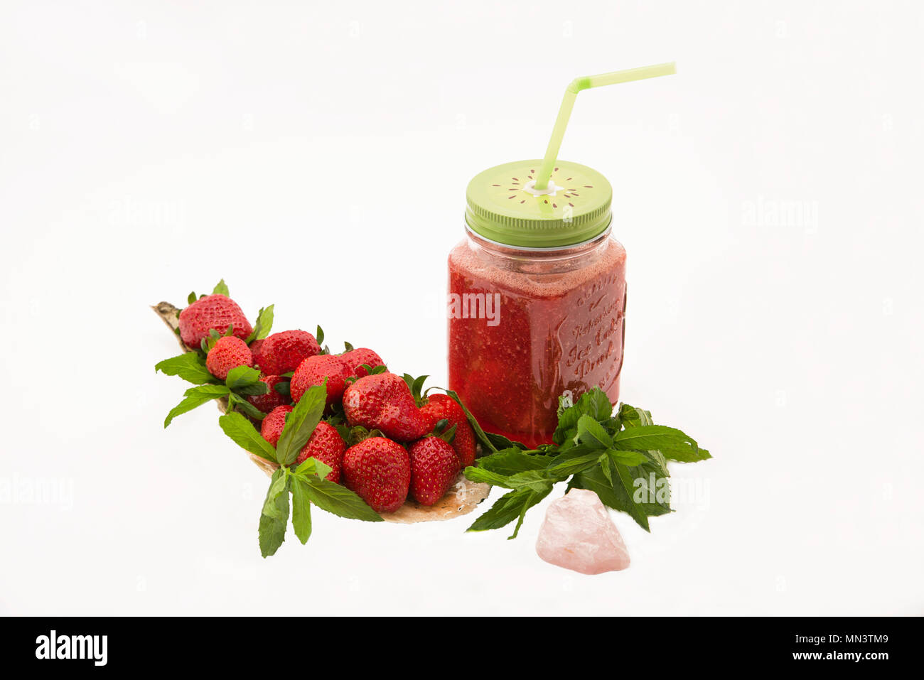 strawberry, mint leaves and strawberry juice on white background Stock ...