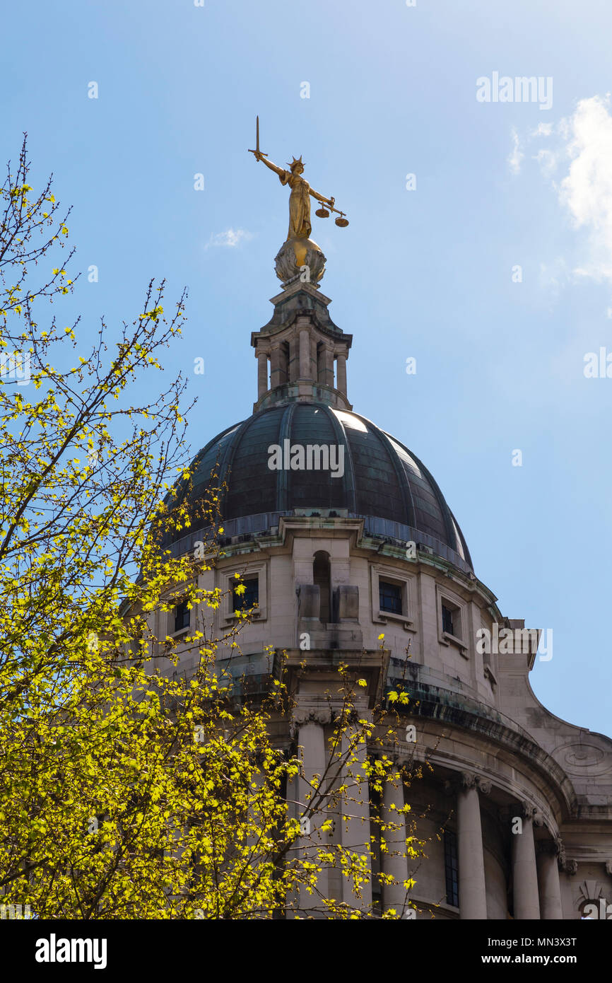 Lady Justice statue on the top of the Old Bailey court building Stock Photo