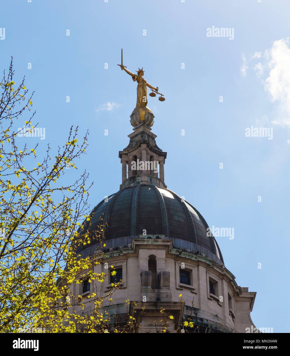 Lady Justice statue on the top of the Old Bailey court building Stock Photo