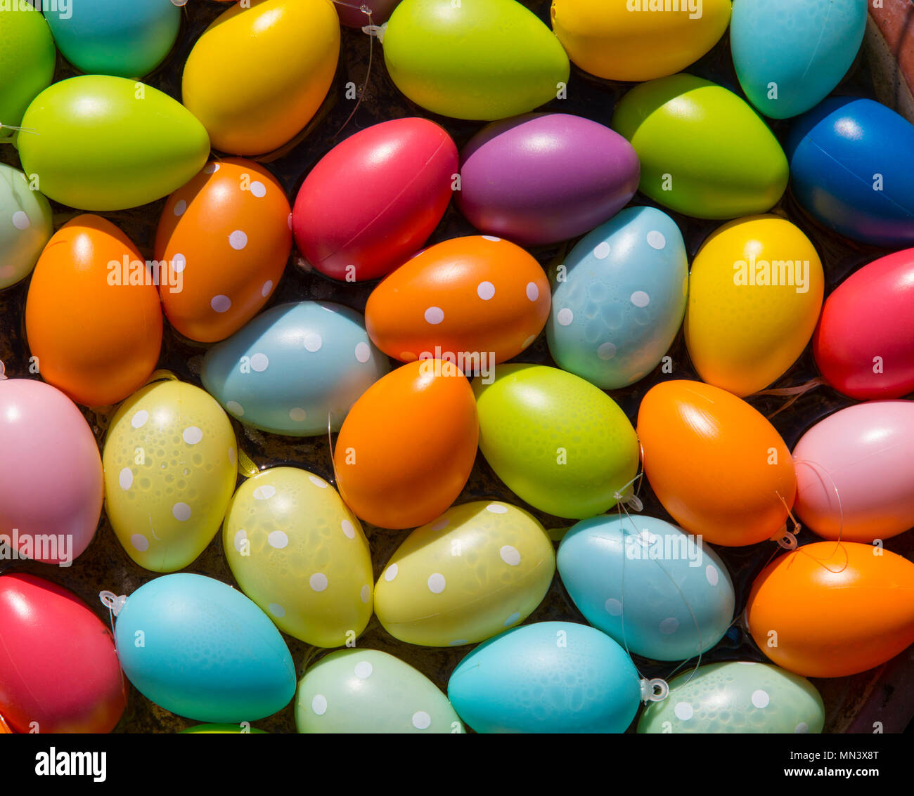 Coloured plastic easter eggs Stock Photo