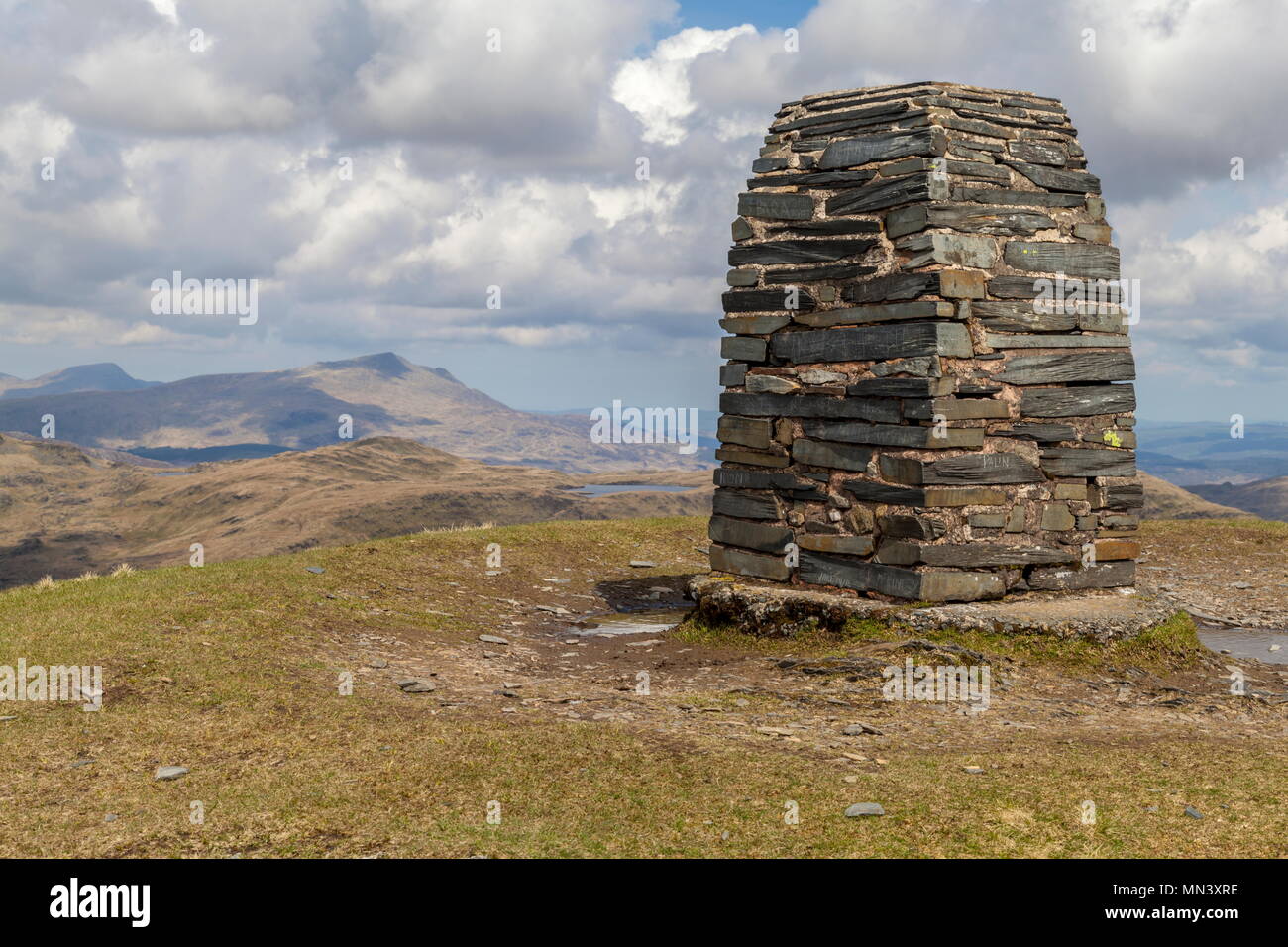 The summit of Moel Siabod can be seen from the Trig Point that stands on the summit of Moelwyn Mawr Stock Photo