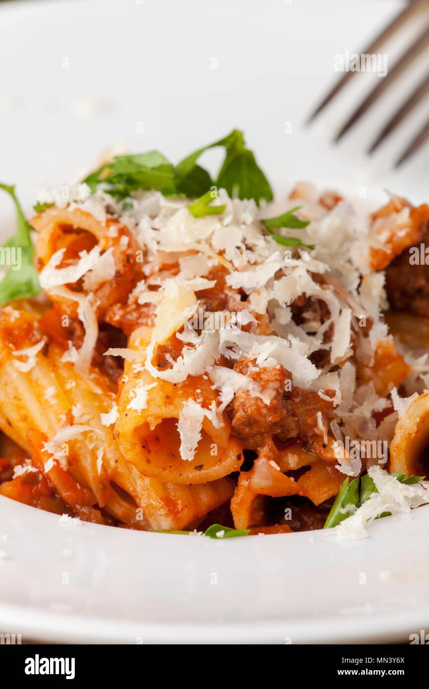 rigatoni pasta with sauce bolognaise and cheese Stock Photo Alamy