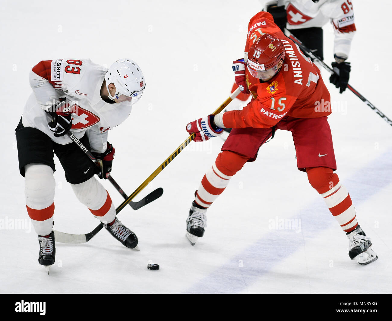 LR JOEL VERMIN (SUI) and ARTEM ANISIMOV (RUS) in action during the Ice