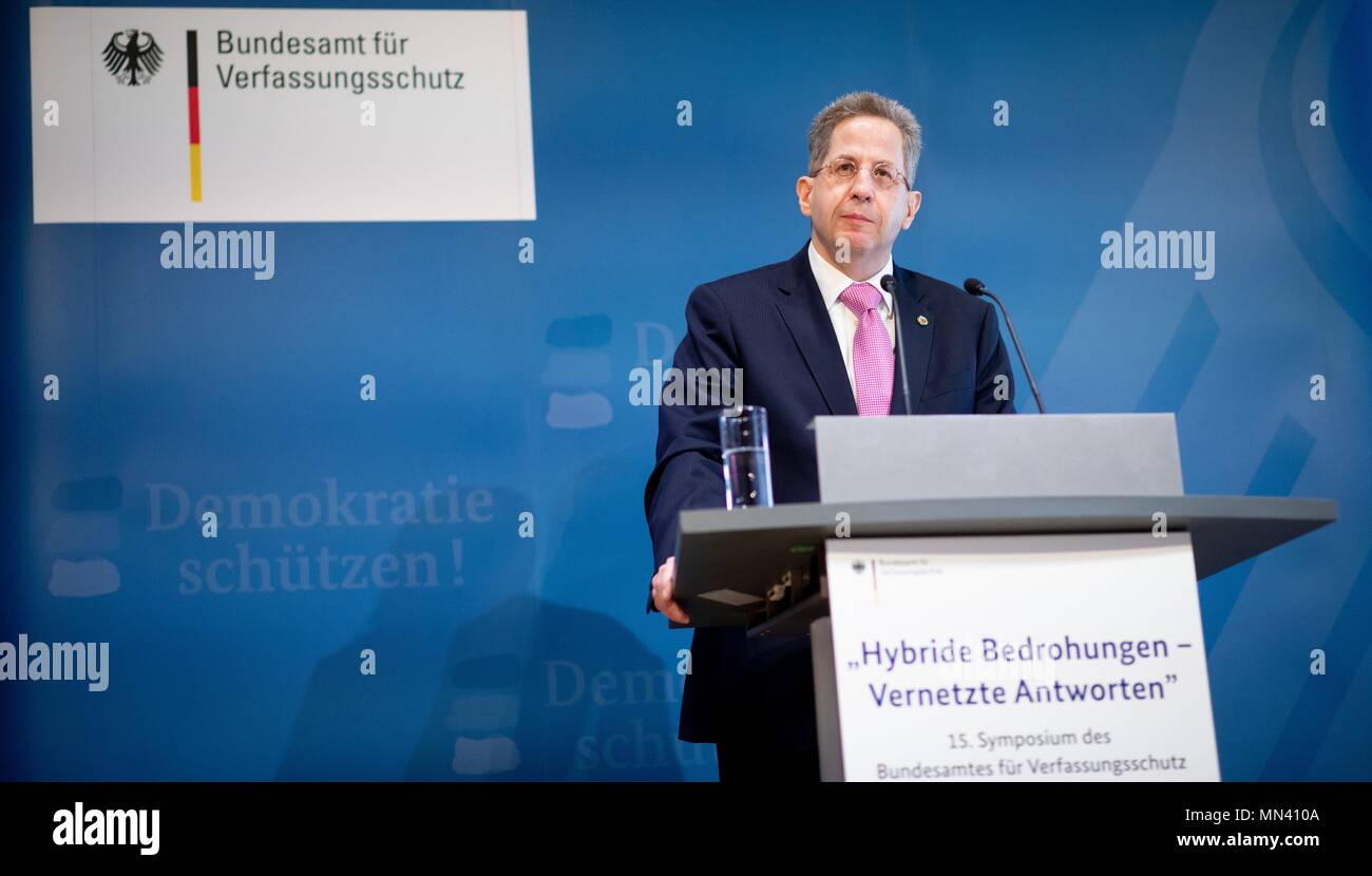 14 May 2018, Germany, Berlin: Hans-Georg Maassen, President of the Bundesamtes fuer Verfassungsschutz (BfV) (lit. Federal Office for Protection of the Constitution), delivers a speech during the symposium of the BfV on the topic 'Hybride Bedrohungen - Vernetzte Antworten' (lit. hybrid threats - integrated answers). Photo: Kay Nietfeld/dpa Stock Photo