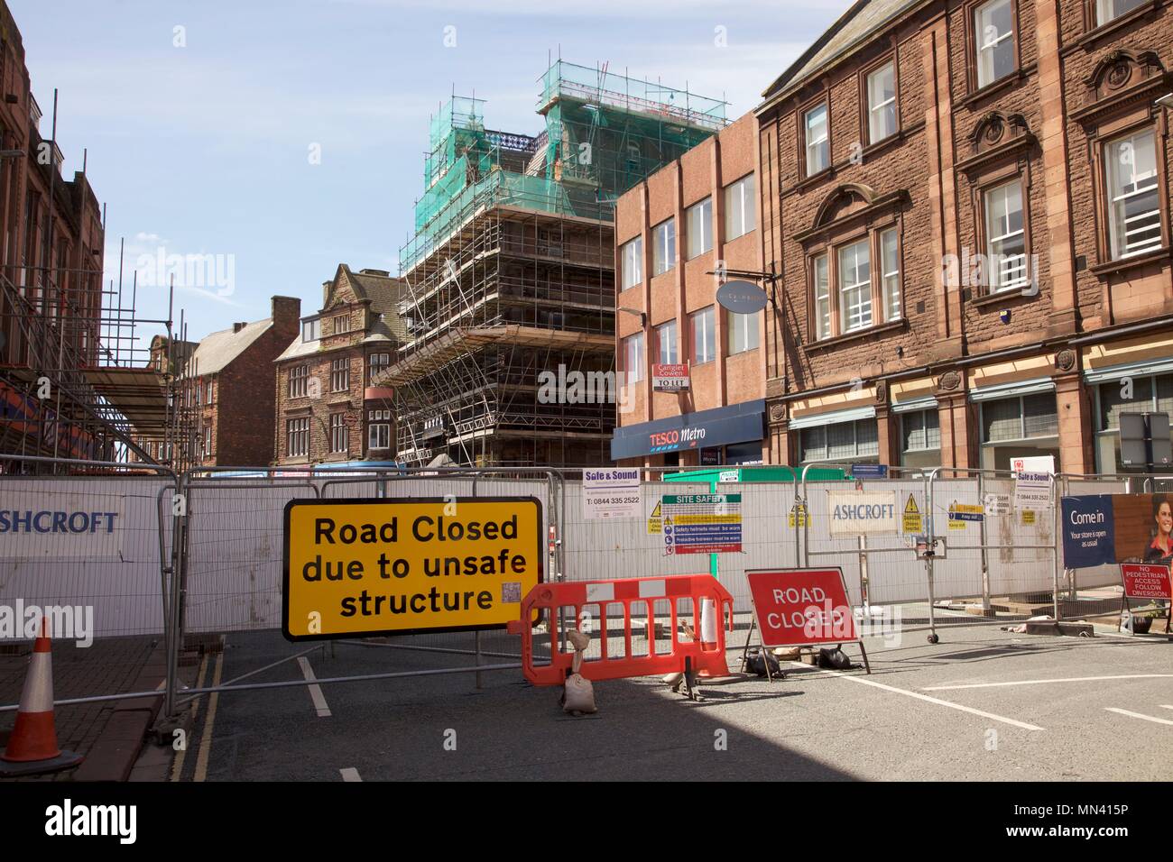 Central Plaza Hotel, Victoria Viaduct, Carlisle, Cumbria, UK. 14th, May, 2018. Main road Victoria Viaduct into the city centre of Carlisle, has been closed for almost two weeks over concerns about the safety of the derelict Central Plaza Hotel building from the dangers posed by seven tonnes of masonry at risk of falling. They are seeking the seeking the de-listing of the grade-II building to make it more attractive to developers. Credit: Andrew Findlay/Alamy Live News Stock Photo