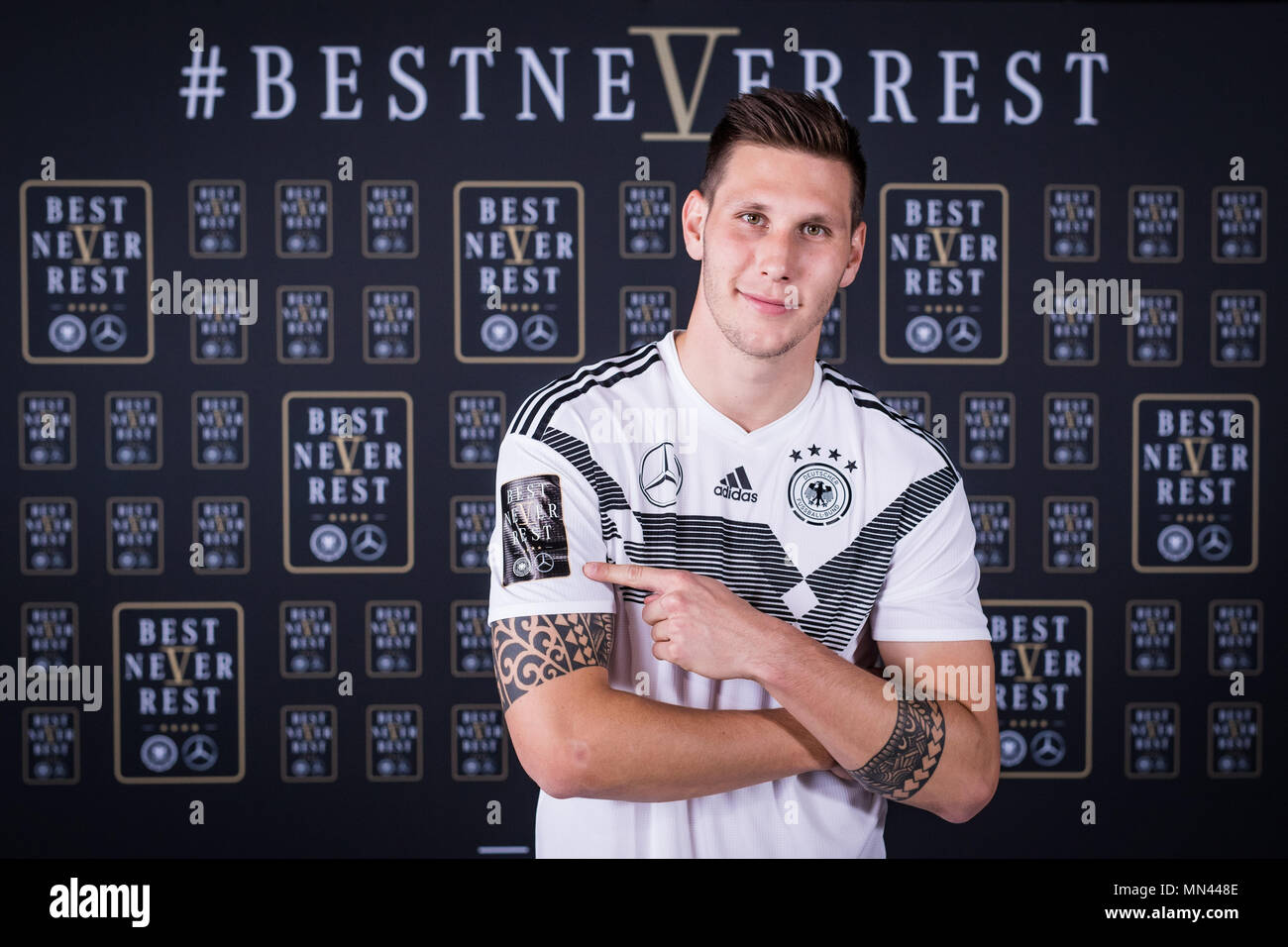 Niklas Suele (Germany) in front of the World Cup logo of the Mercedes-Benz  Generalsupplier (# BEST NEVER REST) Preview / Archive picture: Topic of the  Kaderbekanntgabe on 15.05.2018- GES / Football /