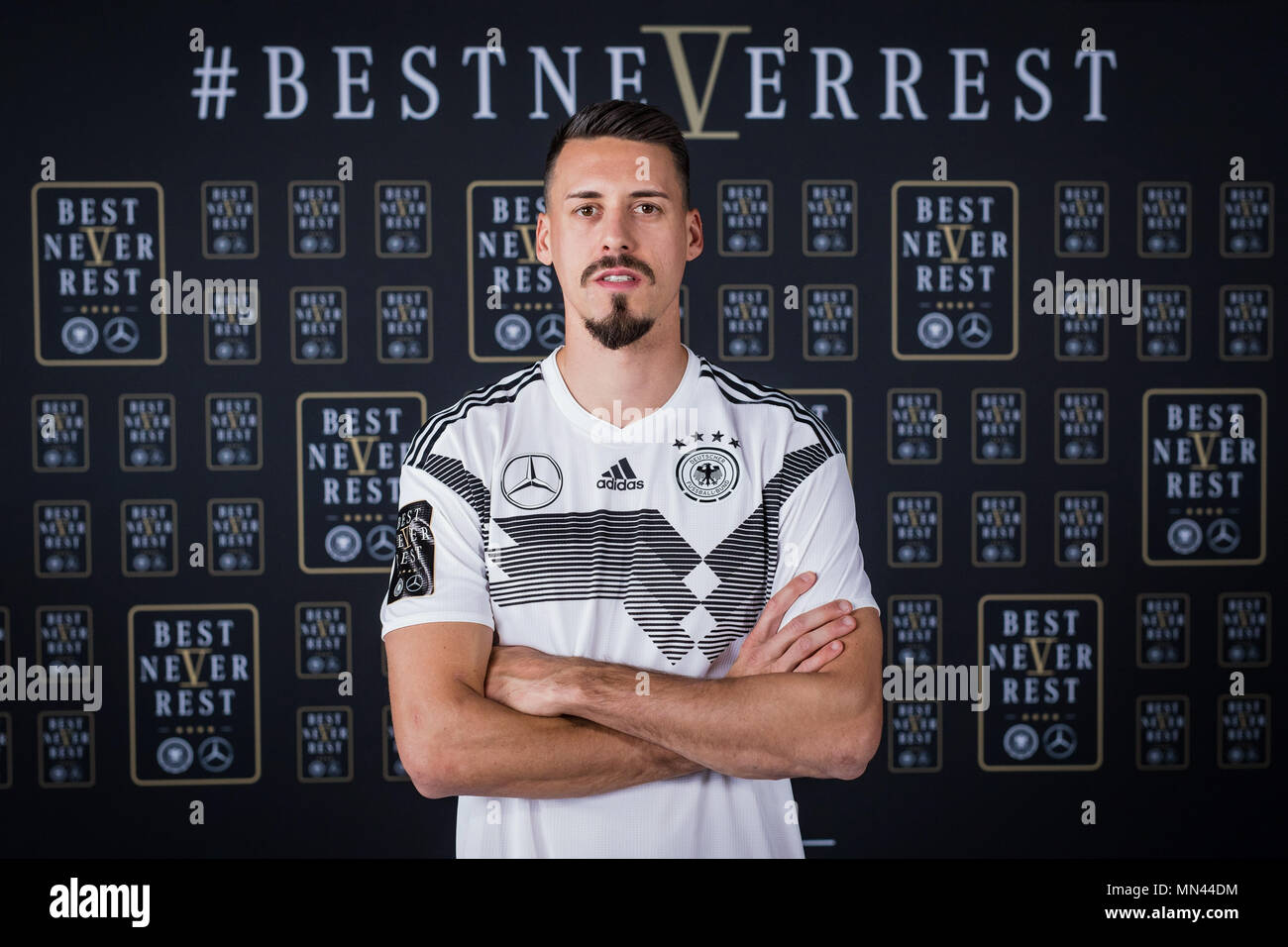 Sandro Wagner (Germany) in front of the World Cup logo of the Mercedes-Benz  Generalsupplier (# BEST NEVER REST) Preview/Archive picture: Topic of the  Kaderbekanntgabe on 15.05.2018- GES/Football/DFB Marketing Day in the  Filmstudios