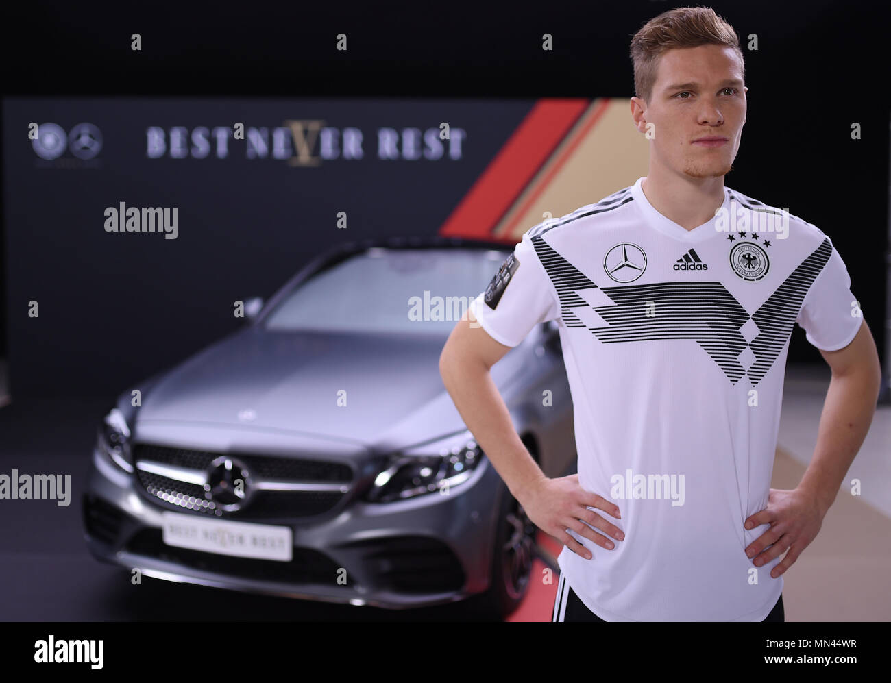 Marcel Halstenberg (Germany) on the Mercedes-Benz C 400 4Matic. Rear: The  World Cup logo of the Mercedes-Benz Generalsupplier (# BEST NEVER REST)  Preview/Archive Image: Topic of the Caderbekanntgabe on 15.05.2018-  GES/Football/DFB Marketing