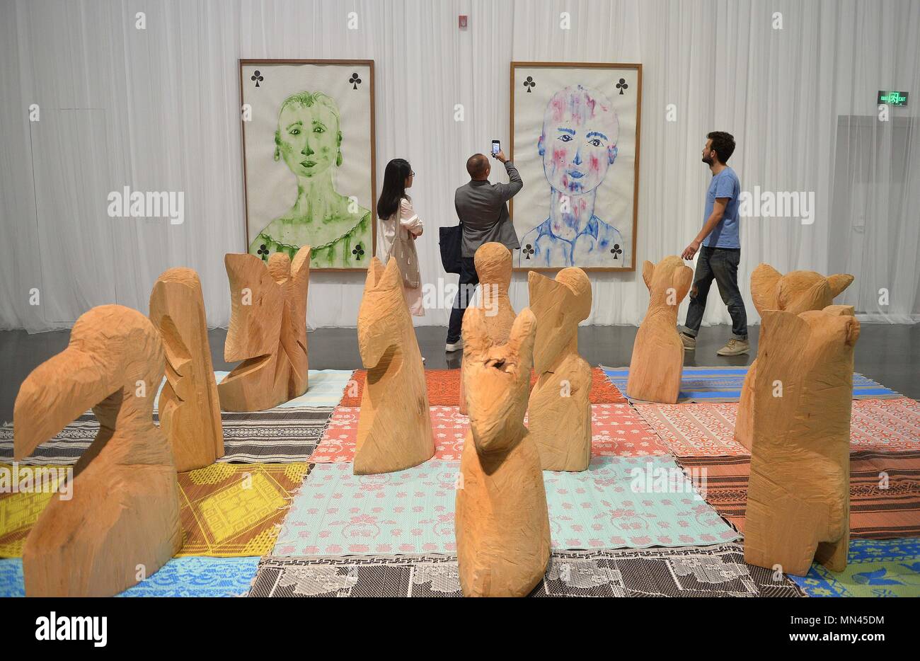 (180514) -- BEIJING, May 14, 2018 (Xinhua) -- Visitors view the exhibits during the 'Bridging the Gap: A Selection of Nominees of the Marcel Duchamp Prize' exhibition at Tsinghua University Art Museum in Beijing, capital of China, May 14, 2018. The exhibition, exhibiting the works of 10 artists selected for the Marcel Duchamp Prize, kicked off on Monday. (Xinhua/Xiao Xiao) (zyd) Stock Photo